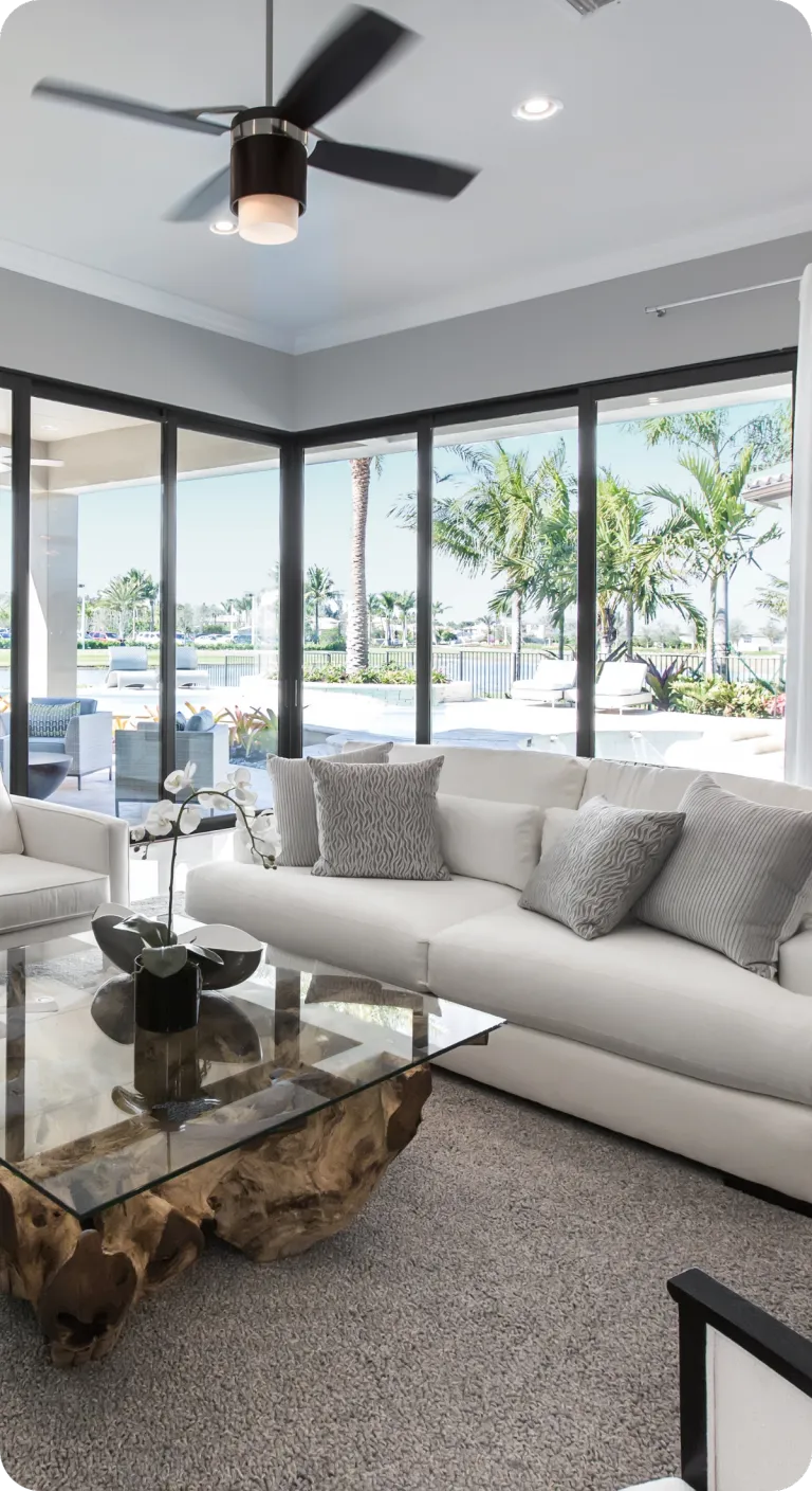 Modern Orlando living room with large windows and natural light — representing trusted, expert home inspections in Orlando, FL.