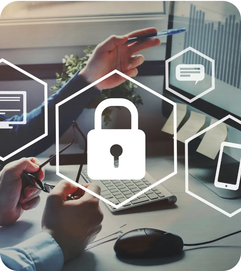 Hands working at a computer with a digital padlock icon overlay symbolizing data privacy and information security.