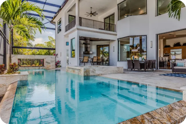 Beautiful modern Davenport home with a screened pool and outdoor patio, representing well-maintained Florida properties inspected by A.C.F. Home Inspections.